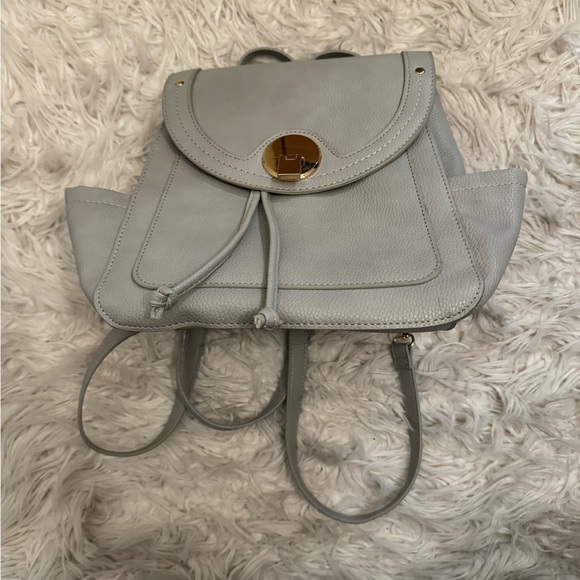 JUSTFAB Grey Circle Flap Backpack with gold buckle - Picture 2 of 9